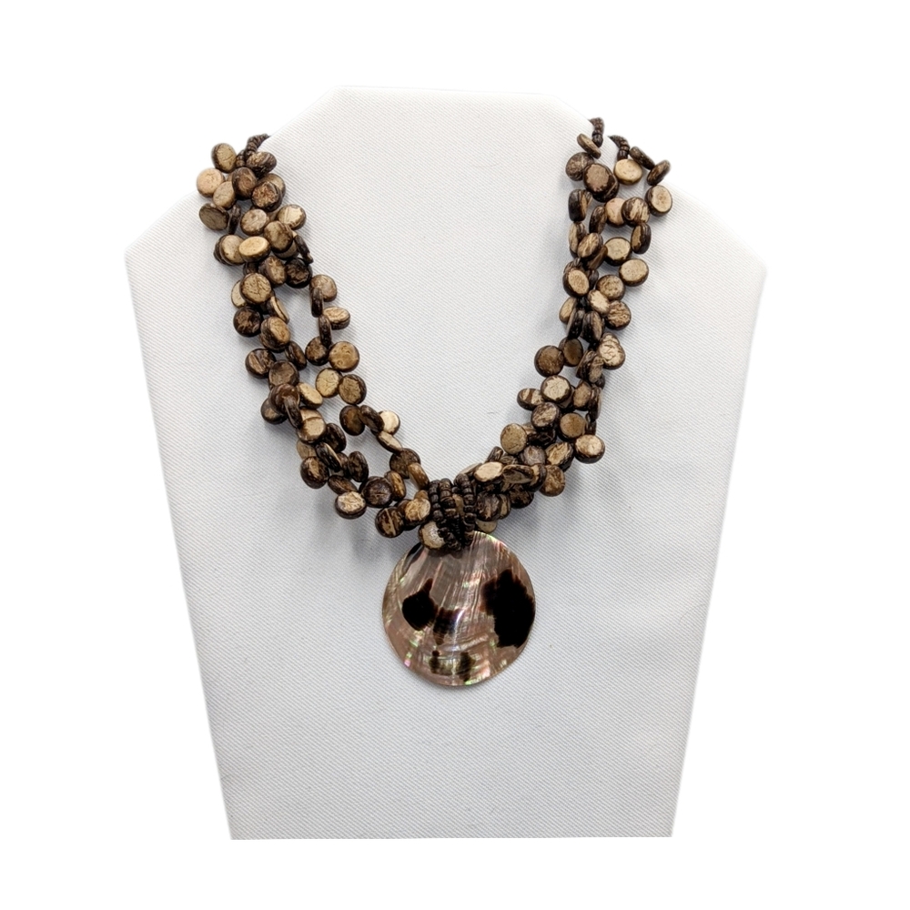 👣4/$20.  Elegant Brown Beaded Necklace with Shell Pendant. NWOT